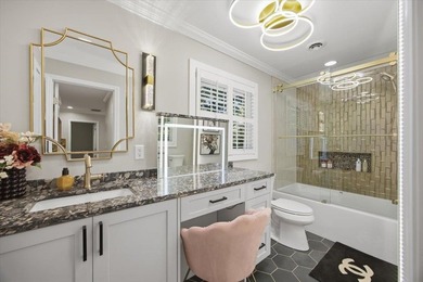 Tucked away on a quiet cul-de-sac in the gated community of the - photo 21
