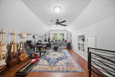 Tucked away on a quiet cul-de-sac in the gated community of the - photo 24