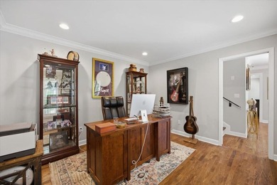 Tucked away on a quiet cul-de-sac in the gated community of the - photo 25
