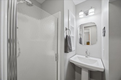 Tucked away on a quiet cul-de-sac in the gated community of the - photo 26