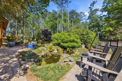 Tucked away on a quiet cul-de-sac in the gated community of the - photo 32
