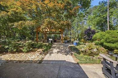 Tucked away on a quiet cul-de-sac in the gated community of the - photo 33