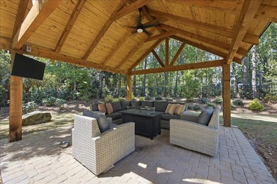 Tucked away on a quiet cul-de-sac in the gated community of the - photo 35
