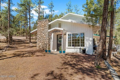 Tucked into two wooded acres of towering ponderosa pine, this is - photo 5