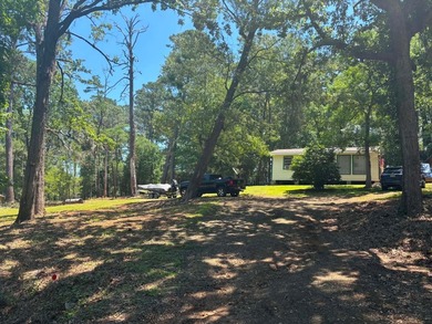 Tucked away in the peaceful waterfront community of White Oak - photo 45