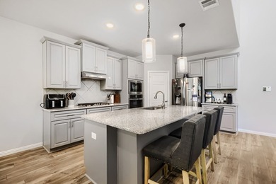 Welcome to this beautifully designed 5-bedroom, 4-bath home in - photo 9