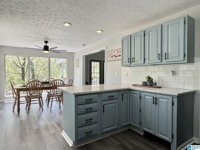 Spacious lake home on a level lot with year-round water! This - photo 11