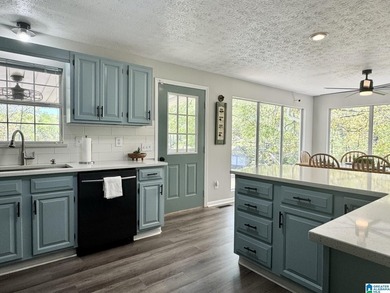 Spacious lake home on a level lot with year-round water! This - photo 12