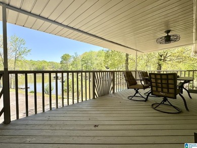 Spacious lake home on a level lot with year-round water! This - photo 13