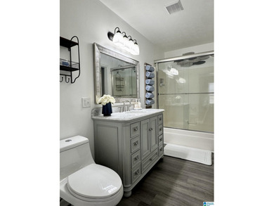 Spacious lake home on a level lot with year-round water! This - photo 15