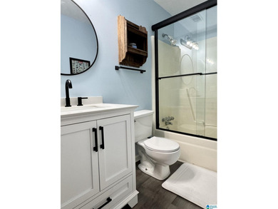 Spacious lake home on a level lot with year-round water! This - photo 17