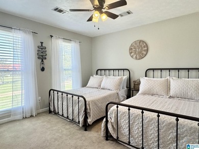 Spacious lake home on a level lot with year-round water! This - photo 18