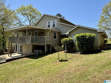 Spacious lake home on a level lot with year-round water! This - photo 29