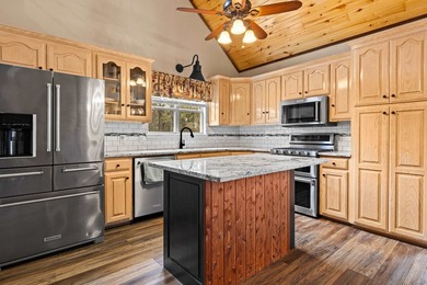 Perched on a scenic hilltop overlooking one of the Twin Lakes - photo 2