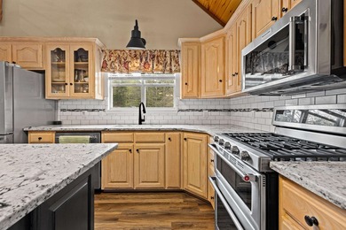 Perched on a scenic hilltop overlooking one of the Twin Lakes - photo 4