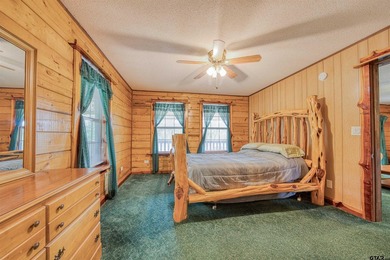 Adorable log cabin on beautiful Lake Winnsboro nestled in a - photo 34