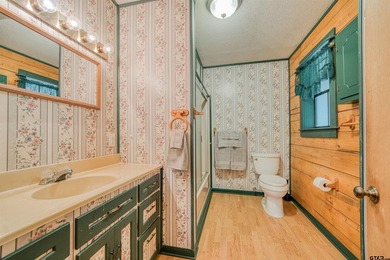 Adorable log cabin on beautiful Lake Winnsboro nestled in a - photo 35