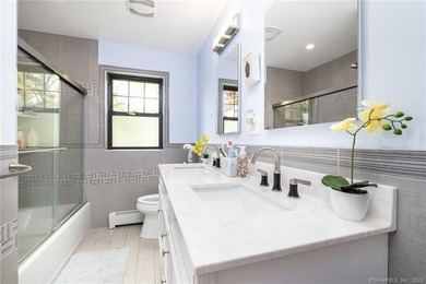 This beautifully renovated two-family home in a highly desirable - photo 16