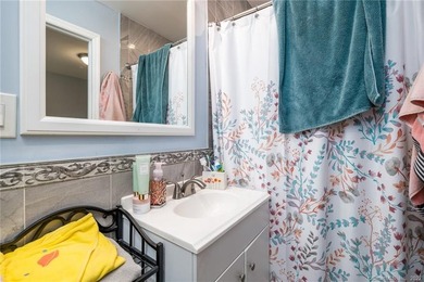 This beautifully renovated two-family home in a highly desirable - photo 17