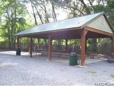 Situated centrally within the Rainbow Springs Community, this - photo 27