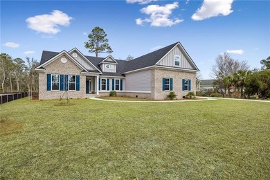 THIS NEWLY COMPLETED CHARLESTON II PLAN BY LANDMARK 24 HOMES - photo 3
