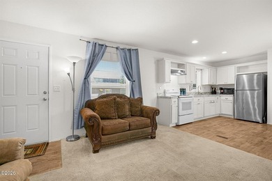 This 2021 manufactured home offers an inviting open floor plan - photo 5