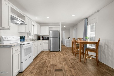 This 2021 manufactured home offers an inviting open floor plan - photo 8