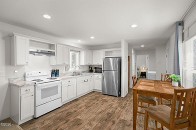 This 2021 manufactured home offers an inviting open floor plan - photo 9