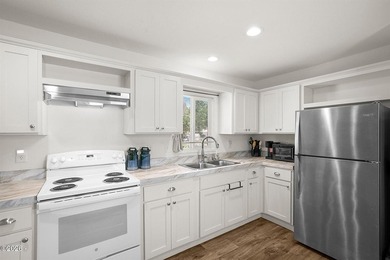 This 2021 manufactured home offers an inviting open floor plan - photo 10
