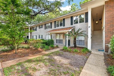 Nestled beneath a canopy of live oaks in the heart of St. Simons - photo 1