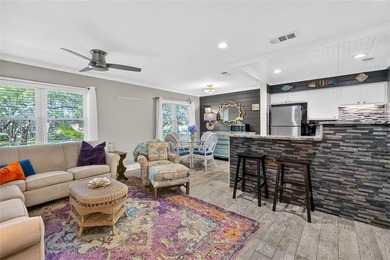 Nestled beneath a canopy of live oaks in the heart of St. Simons - photo 3