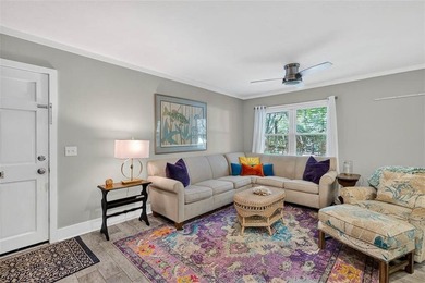 Nestled beneath a canopy of live oaks in the heart of St. Simons - photo 4