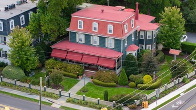 The historic Thomas Webster House, built in 1876, prominently - photo 2