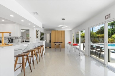 Embrace the epitome of luxury in this expansive 6-bedroom - photo 7