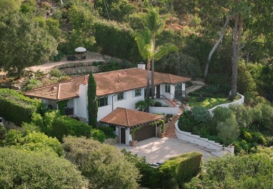Situated on one of the Riviera's most sought-after streets, this - photo 1