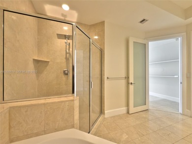 Experience true Miami living in this stunning 2-bedroom