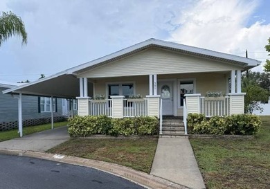 Welcome home to this beautifully updated 2006 Palm Harbor - photo 1