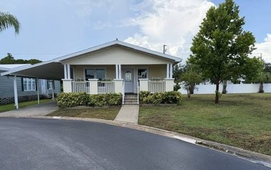 Welcome home to this beautifully updated 2006 Palm Harbor - photo 7