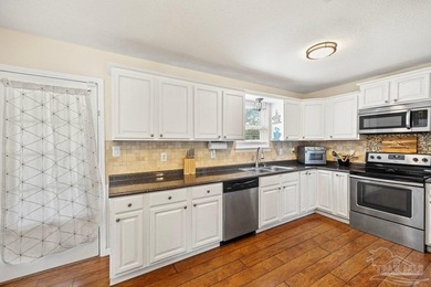 Nice 4-bedroom, 2-bath home featuring a 2023 roof, a large - photo 12