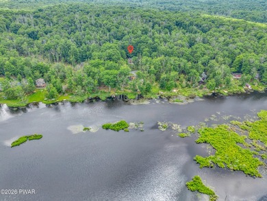 Nestled on a private second-tier lake lot, this charming ranch - photo 4