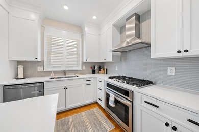 Situated on a 60'x110' lot in the south end of Avalon, this Tom - photo 8