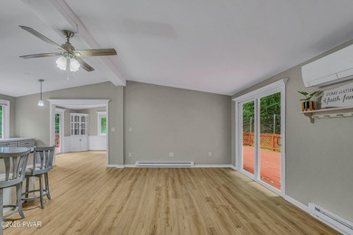 Nestled on a private second-tier lake lot, this charming ranch - photo 8