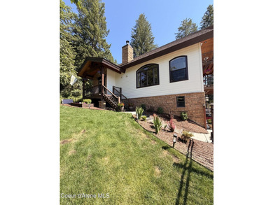 Welcome to your mountain escape in scenic Sagle, Idaho! This - photo 2