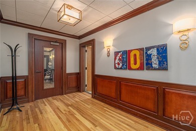 Perched on the 6th floor of The DeSoto, this residence offers a