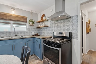 Just three blocks from Aransas Bay, this beautifully updated - photo 12