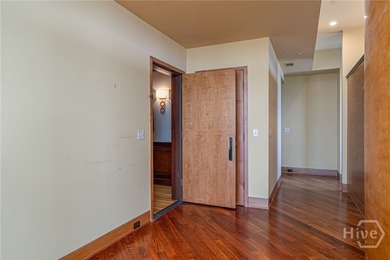 Perched on the 6th floor of The DeSoto, this residence offers a