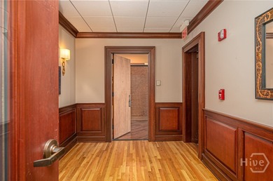 Perched on the 6th floor of The DeSoto, this residence offers a