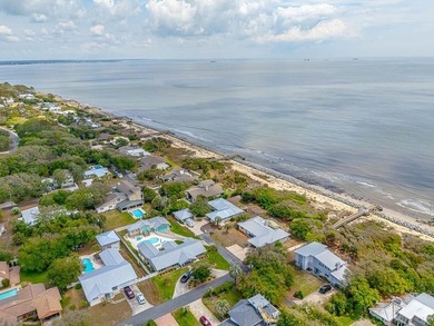Experience the ultimate in coastal iving with this exceptional - photo 6