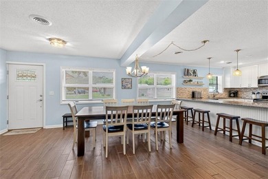 Experience the ultimate in coastal iving with this exceptional - photo 9