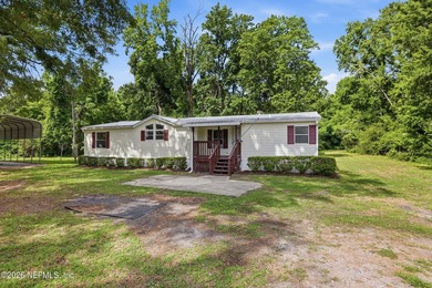 Move in ready on one acre of private land! Country feel, city - photo 11